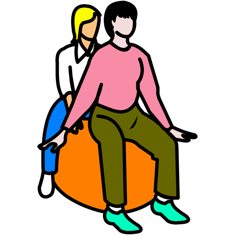 a white person with black hair wearing a pink sweater and green trousers sitting on an orange shape, being positioned by a blonde white person behind them wearing a white buttonup and blue trousers.